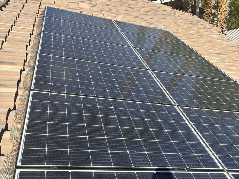 Solar panels on a tile roof, before