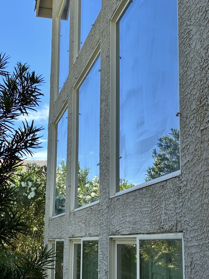 Tall two-story windows, before