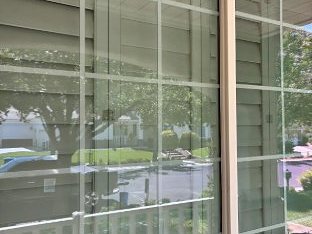 Same front window, streak-free after cleaning