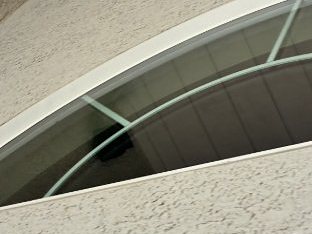 Same arched window, clean after cleaning